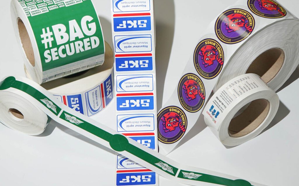 a rolls of labels on a white surface