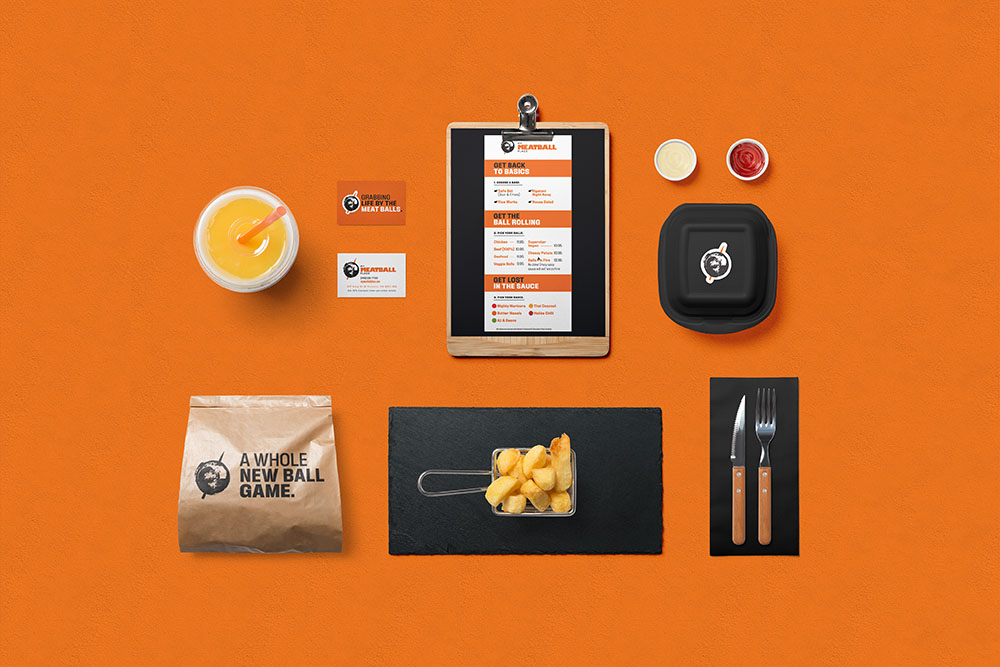 a table with food and a menu