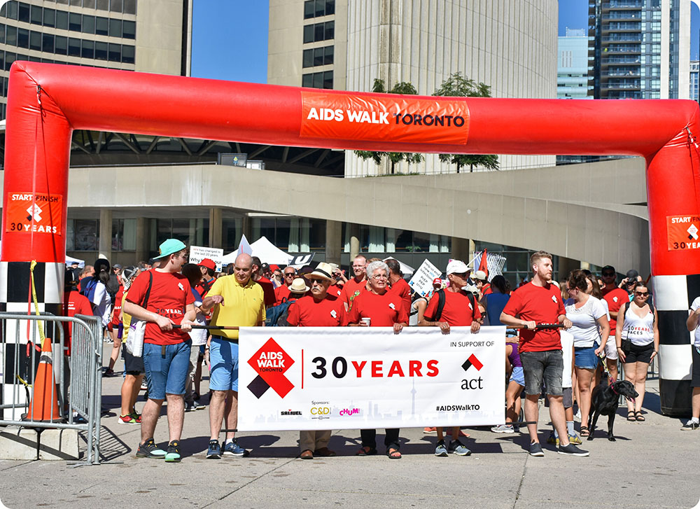 a group of people holding a banner