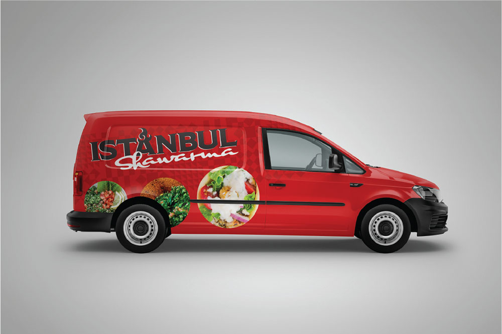 a red van with a picture of food on it