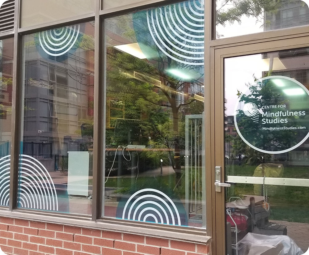 a window with vinyls on a building