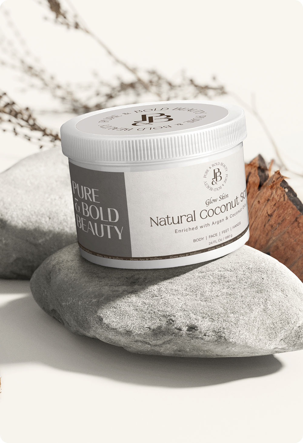 a jar of coconut scrub on a rock