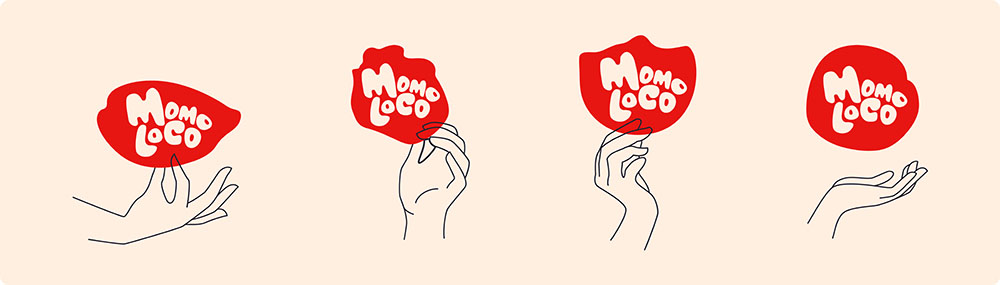 a pair of hands holding a red sign