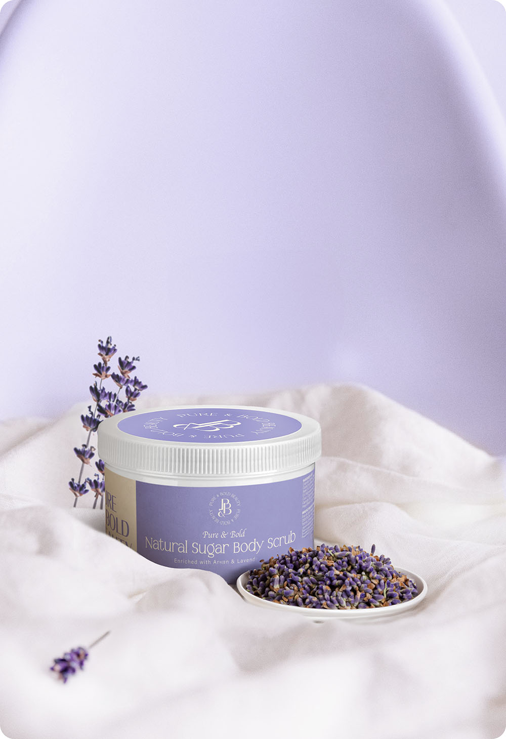 a jar of sugar scrub and a bowl of lavender flowers
