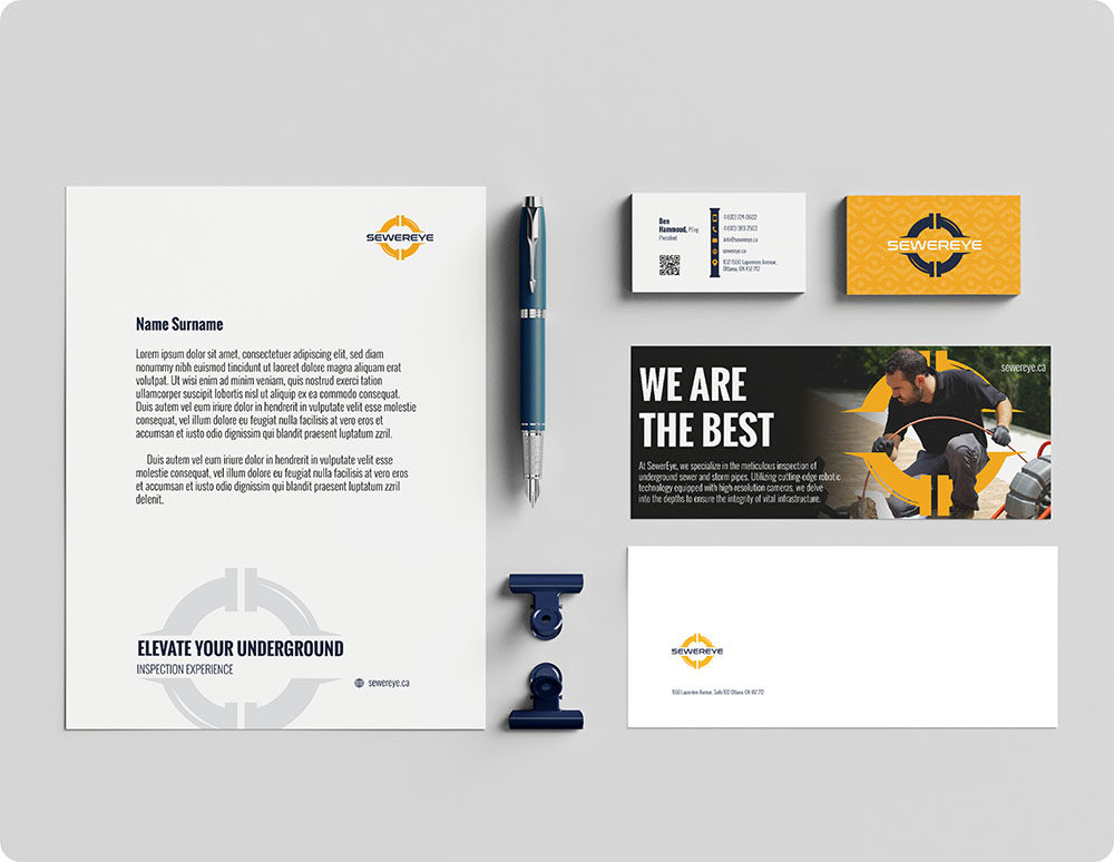 a stationery and pen on a table